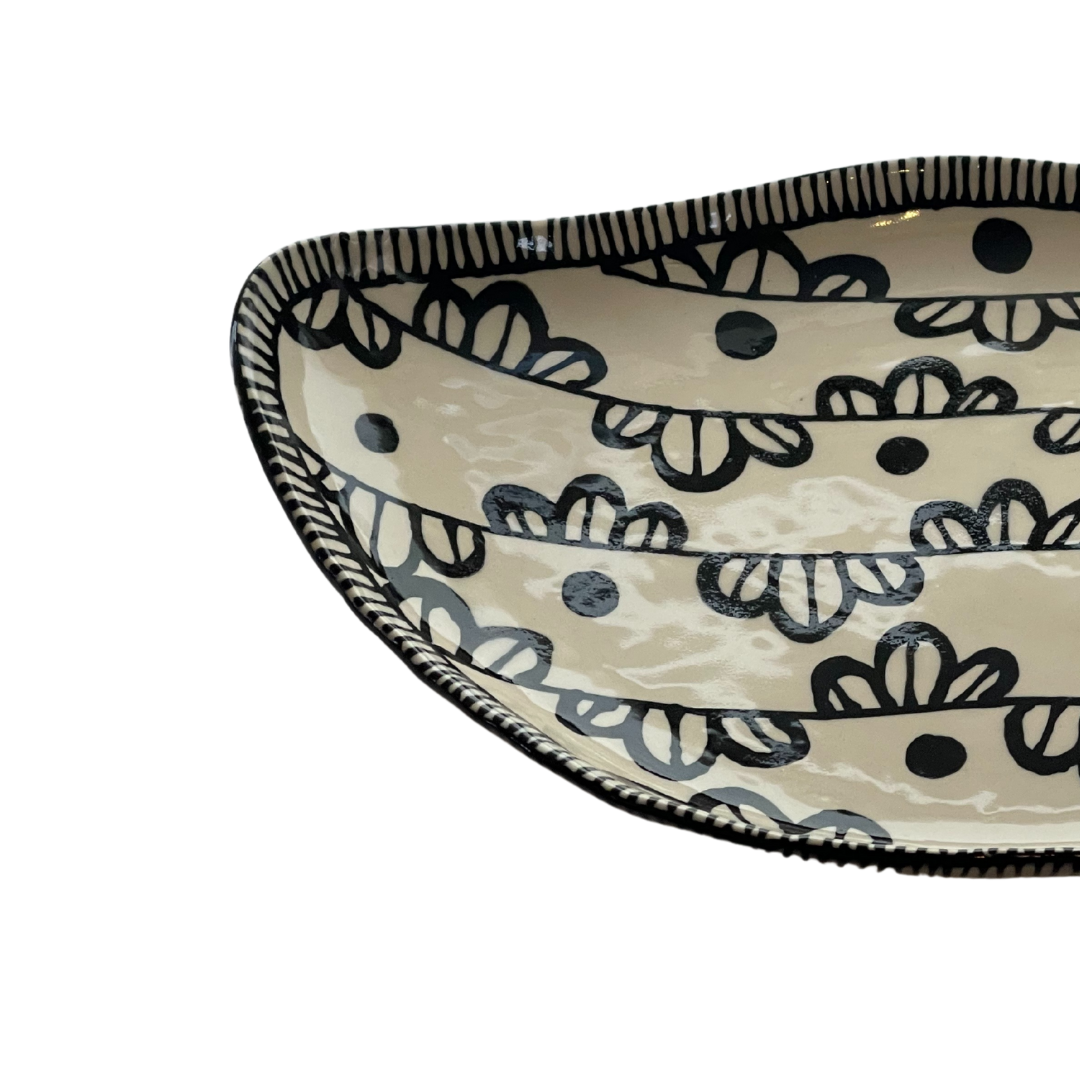 Handmade Black Freeform Pottery Dish with black design around the rim