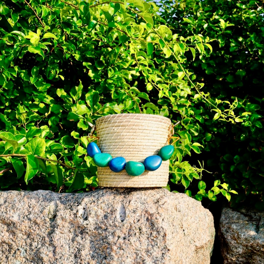 Handcrafted Natural Round Handbag with Turquoise Handle